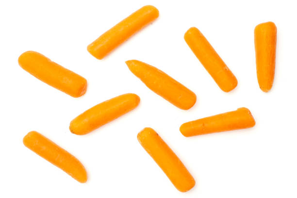 очищенная морковка ребенка изолиро�вана на белом - carrot isolated white carotene стоковые фото и изображения
