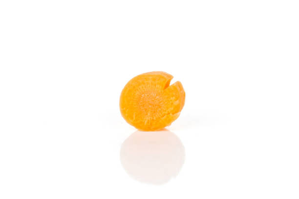 istock Peeled baby carrot isolated on white 1163417359