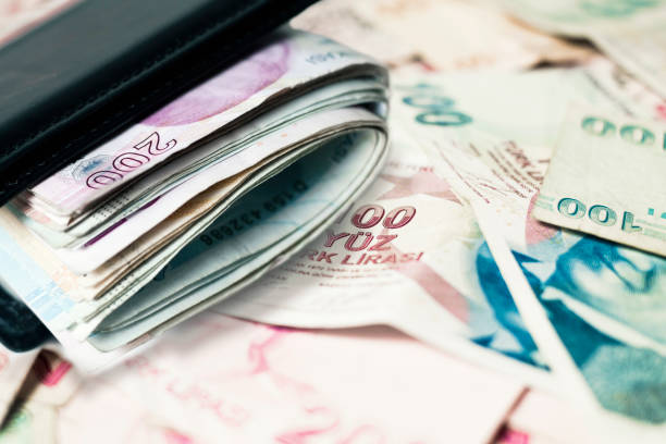 istock Turkish lira banknote in wallet and banknote background 1163421841