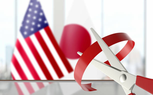 istock Flags are Paired at Background While Scissors is Cutting Ribbon 1163422522