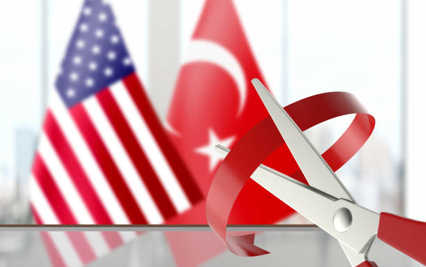 istock Flags are Paired at Background While Scissors is Cutting Ribbon 1163422544