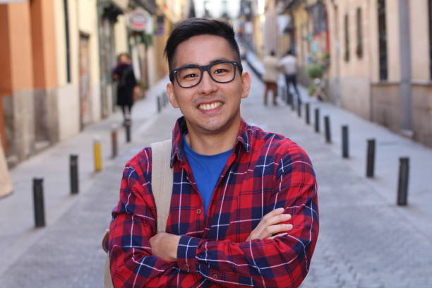istock Asian university student outdoors portrait 1163424226