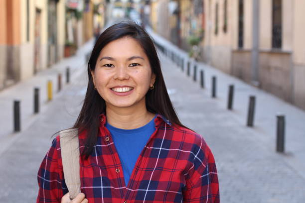 istock Foreign female student outdoor close up 1163424253