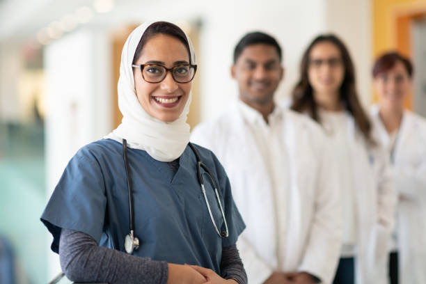 istock Muslim doctor leads her medical team 1163427831