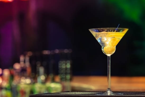 istock Martini at the bar counter. Classic cocktail in the bar 1163428059