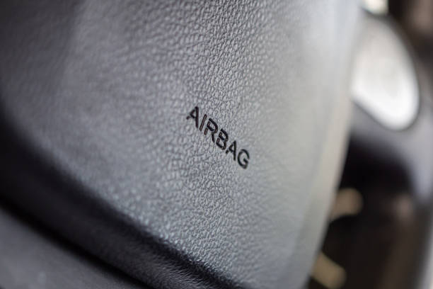 istock Safety airbag sign on car steering wheel 1163428643