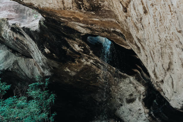 istock creek water stream waterfall flowing in forest 1163429793