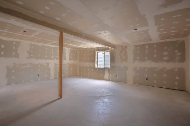istock Room interior under construction with unfinished wall ceiling and floor 1163431356