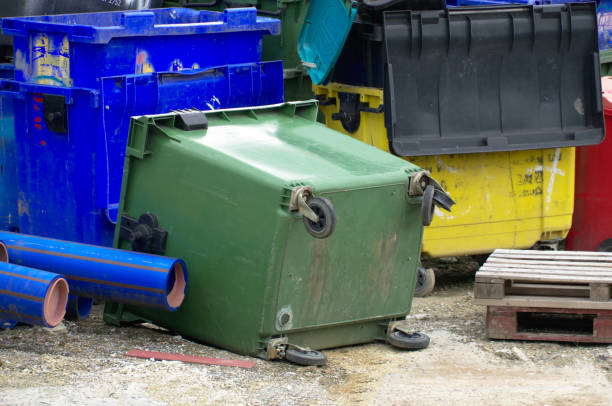 istock Broken trash can lying on the ground. Clean living concept. 1163435599