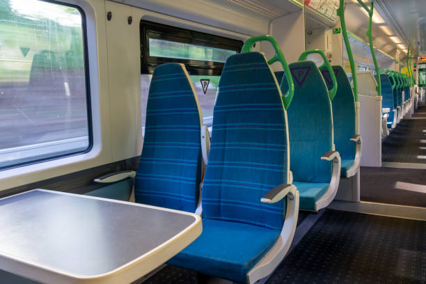 istock White light panoramic view interior of a high speed electric modern train with blue seats 1163435633