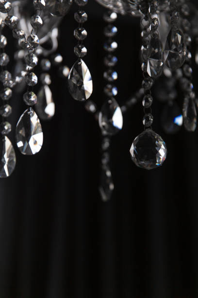 istock chandelier with pendants, isolated on black selective focus 1163441880