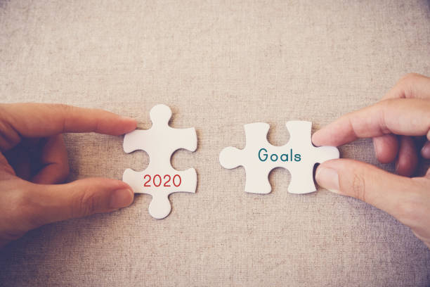 istock Hands with puzzle pieces and 