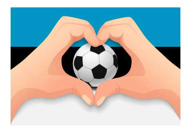 istock Estonia soccer ball and hand heart shape 1163451945
