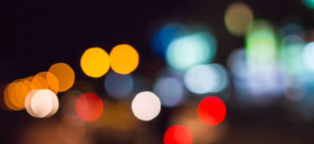 istock abstract blurred of blue and silver glittering shine bulbs lights background 1163454802