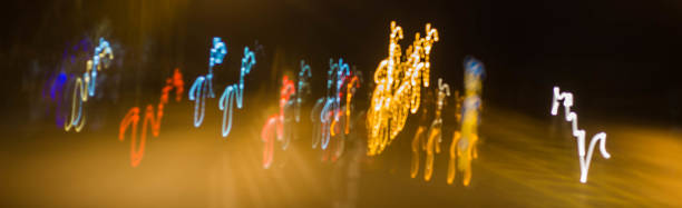 istock abstract blurred of blue and silver glittering shine bulbs lights background 1163454842
