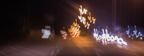 istock abstract blurred of blue and silver glittering shine bulbs lights background 1163454855