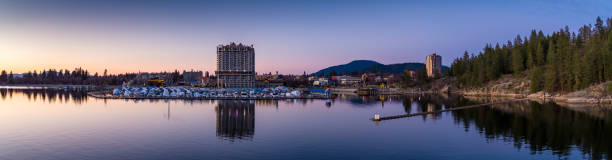 Aerial Panorama of Coeur d'Alene, Idaho at Sunset Aerial panorama of the waterfront and marina of Coeur d'Alene, Idaho at twilight. choeur stock pictures, royalty-free photos & images