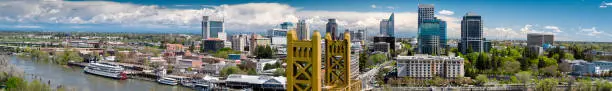 Aerial panorama of Sacramento, from Tower Bridge with the city skyline behind.