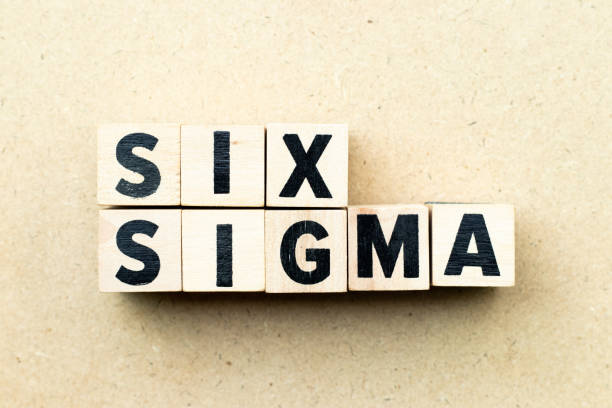 istock Letter block in word six sigma on wood background 1163456698