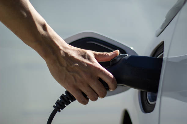 istock Charging electric car or hybrid car 1163456988