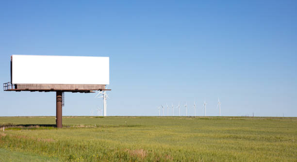 istock Billboard blank on a highway for advertisement, spring sunny day 1163458840