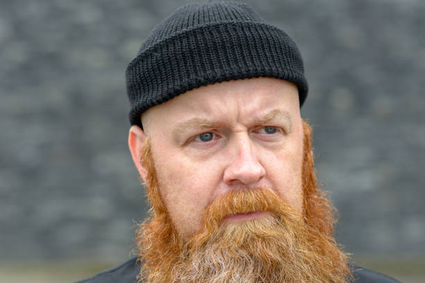 istock Thoughtful bearded man staring off to the side 1163460605