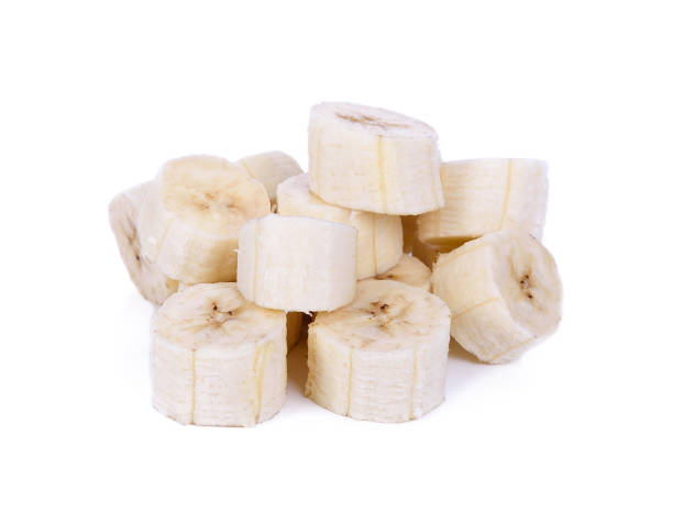 istock Sliced bananas on a white background 1163464619