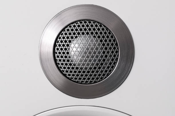 istock metal tweeter loudspeaker close up on a white wall 1163467269