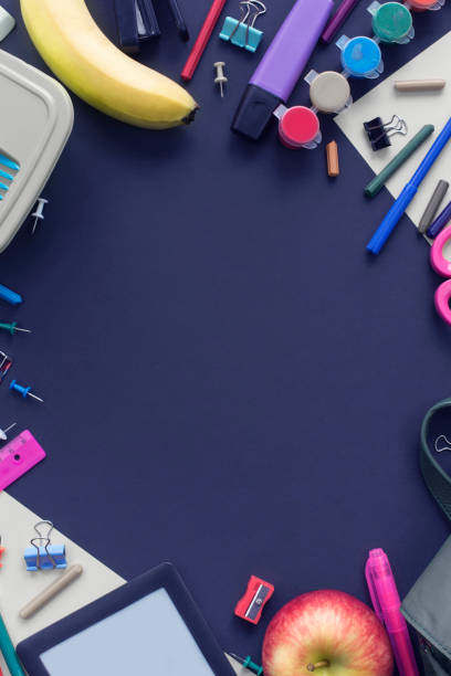 istock Banner Background back to school with copy space. Stationery pencil pen ruler backpack lunch box on black background 1163469567