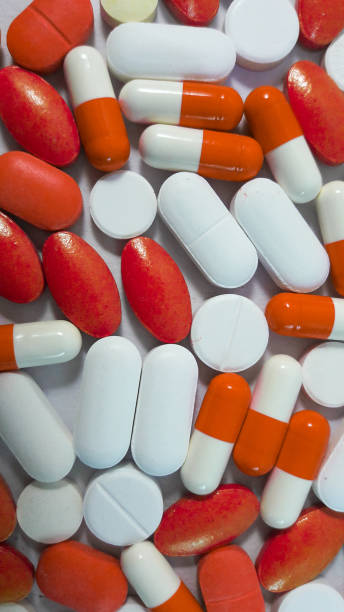 istock Capsule tablets colourful wallpaper for medical use 1163469717