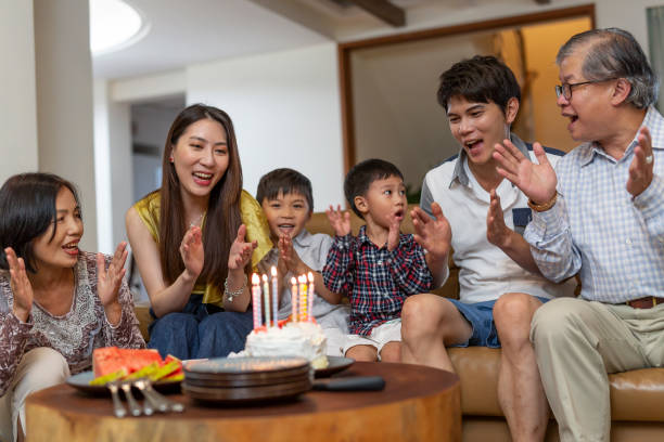 istock Family Singing Happy Birthday 1163470278