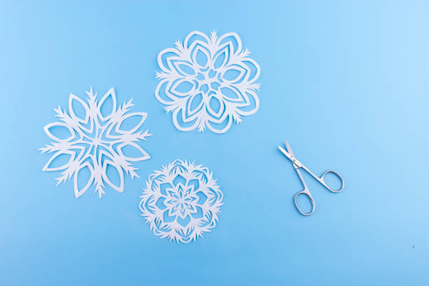 istock snowflakes made of paper 1163470996