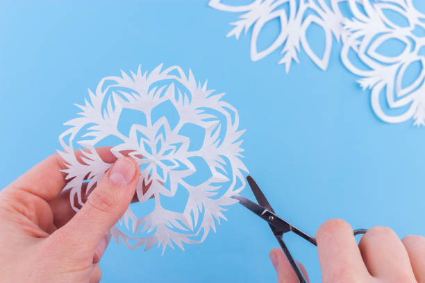 istock snowflakes made of paper 1163471000