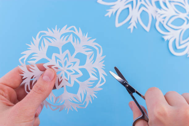 istock snowflakes made of paper 1163471002