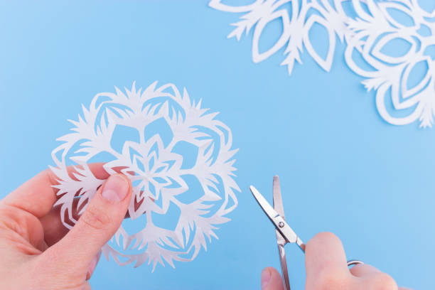 istock snowflakes made of paper 1163471006