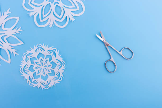 istock snowflakes made of paper 1163471076