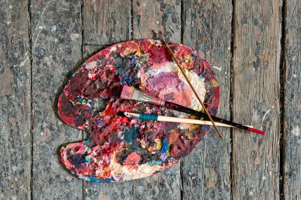 istock Artist paint brushes and palette 1163472555