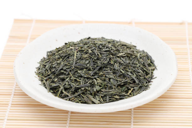 istock Japanese dried tea leaves with green tea leaves 1163473210