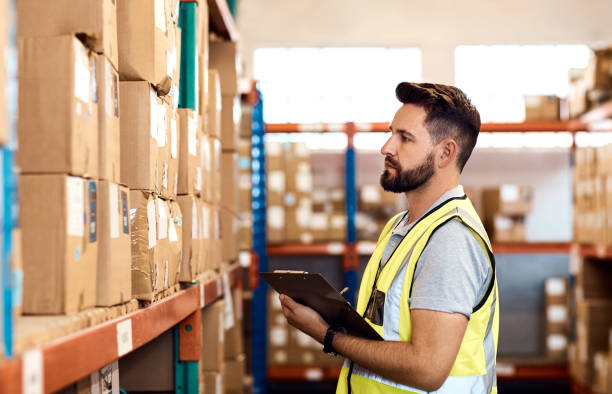 istock He puts great effort into running a successful warehouse 1163476291
