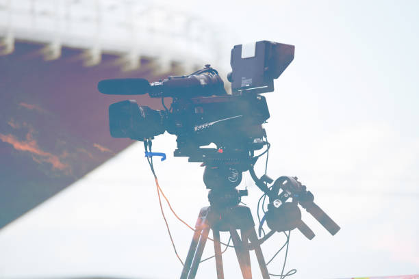 istock movie camera on the street 1163477360