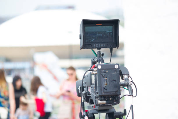 istock movie camera on the street 1163477448