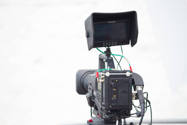istock movie camera on the street 1163477457