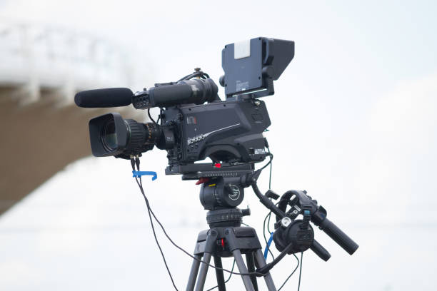 istock movie camera on the street 1163477460