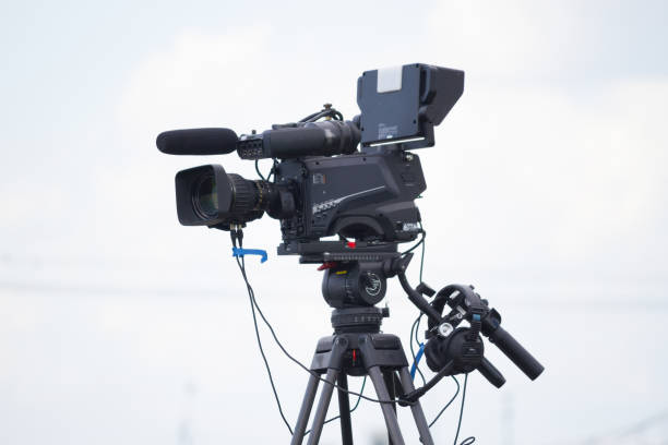 istock movie camera on the street 1163477462