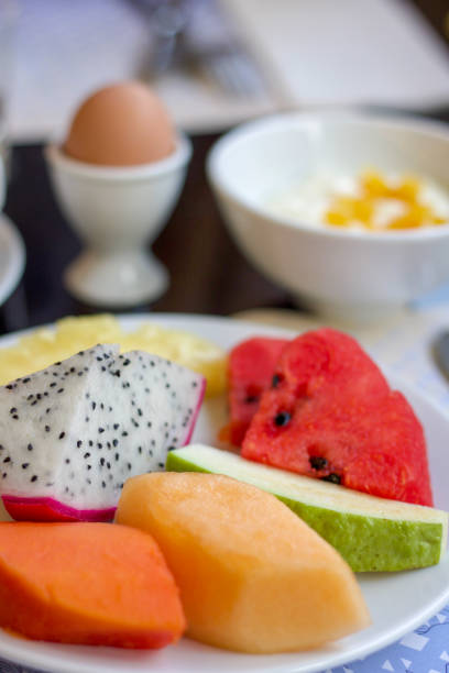 istock healthy tropical breakfast with different exotic fruits 1163477746