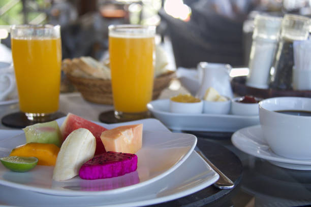 istock tropical breakfast with assortment of fruits 1163477906