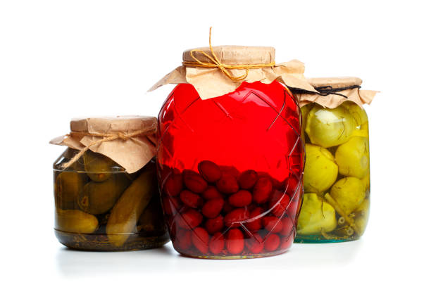 istock set og  glass bottles with preserved food on white background - Image 1163479644