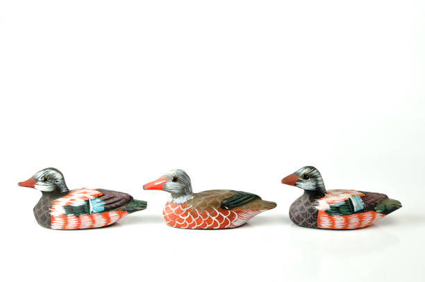 istock Wooden Ducks in the Row 1163480281