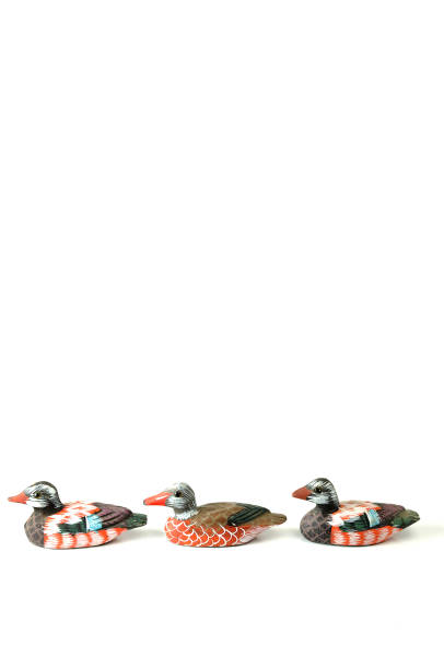 istock Wooden Ducks in the Row 1163480479