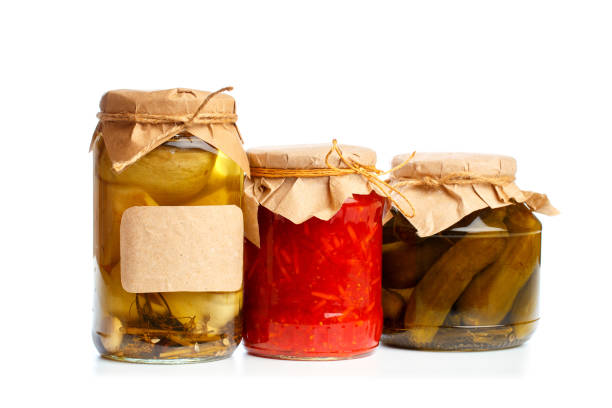 istock set og  glass bottles with preserved food on white background - Image 1163480669